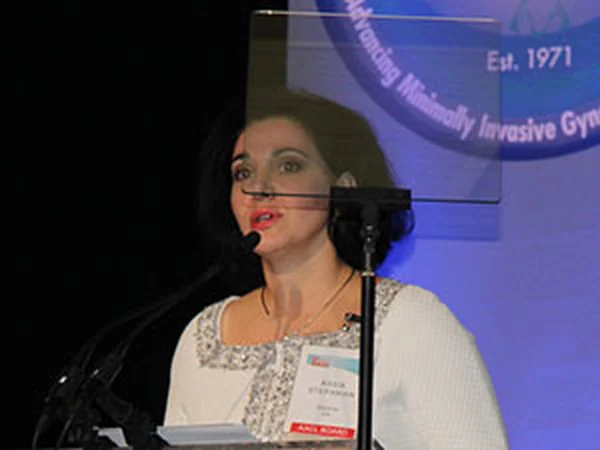 Dr. Assia Stepanian speaking at an AAGL meeting on minimally invasive gynecology